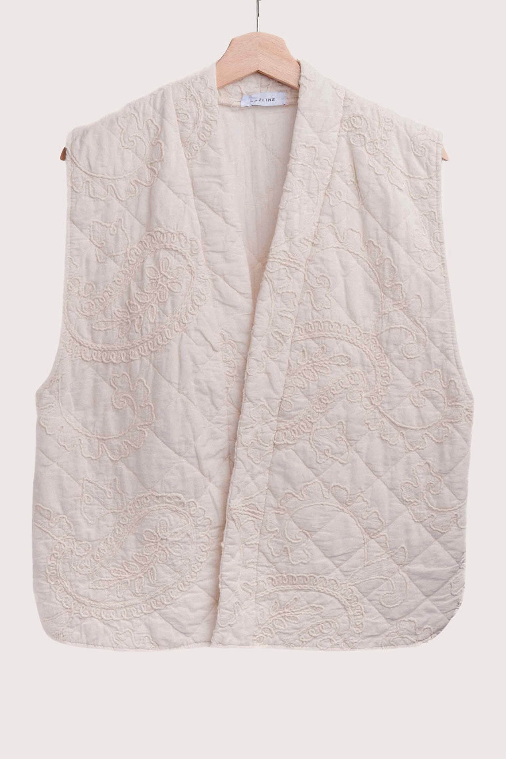 Ivory Cotton Quilted Vest for what to wear to round top
