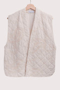 Ivory Cotton Quilted Vest for what to wear to round top