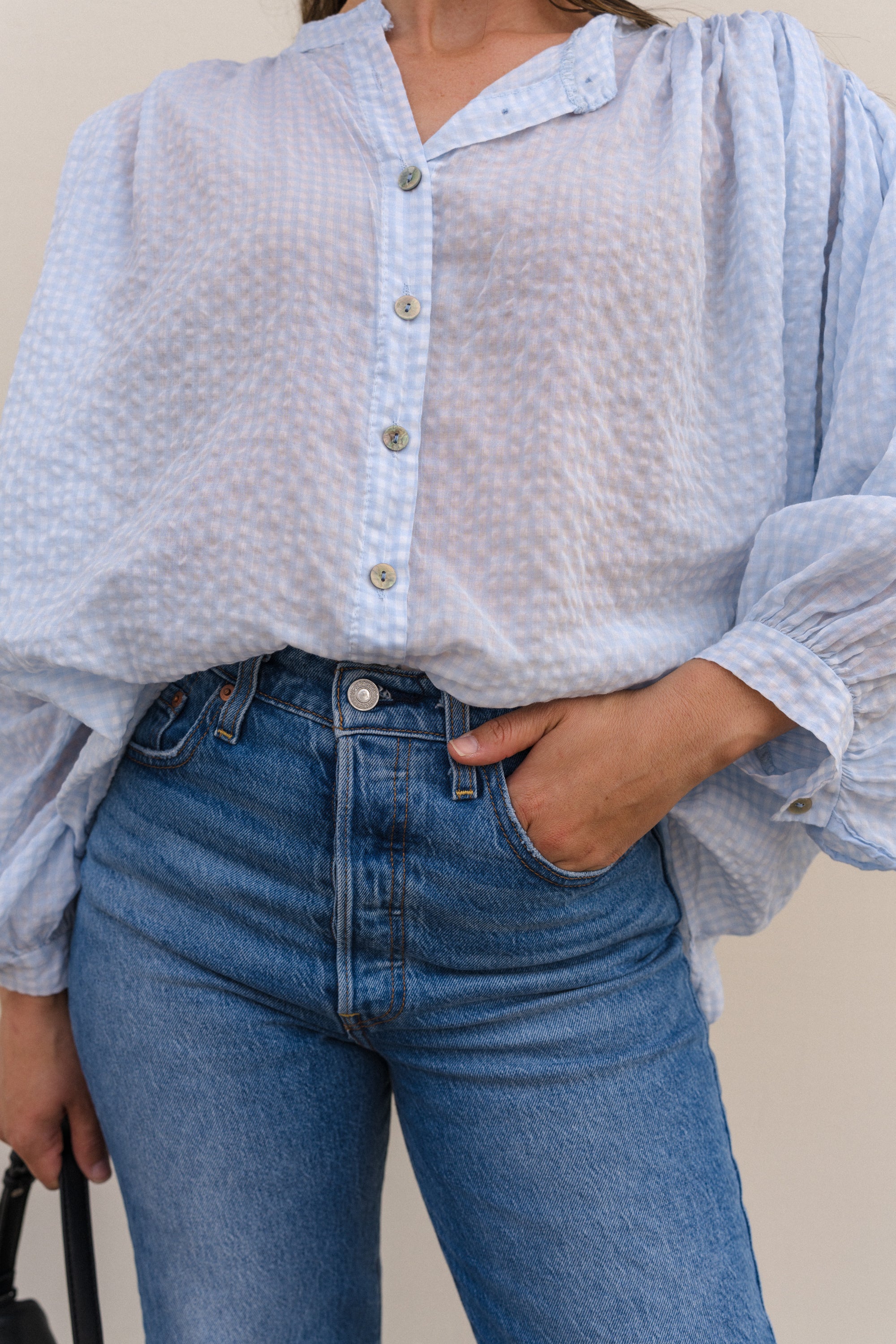 Flowy blue cotton gingham blouse for women with button front and relaxed fit