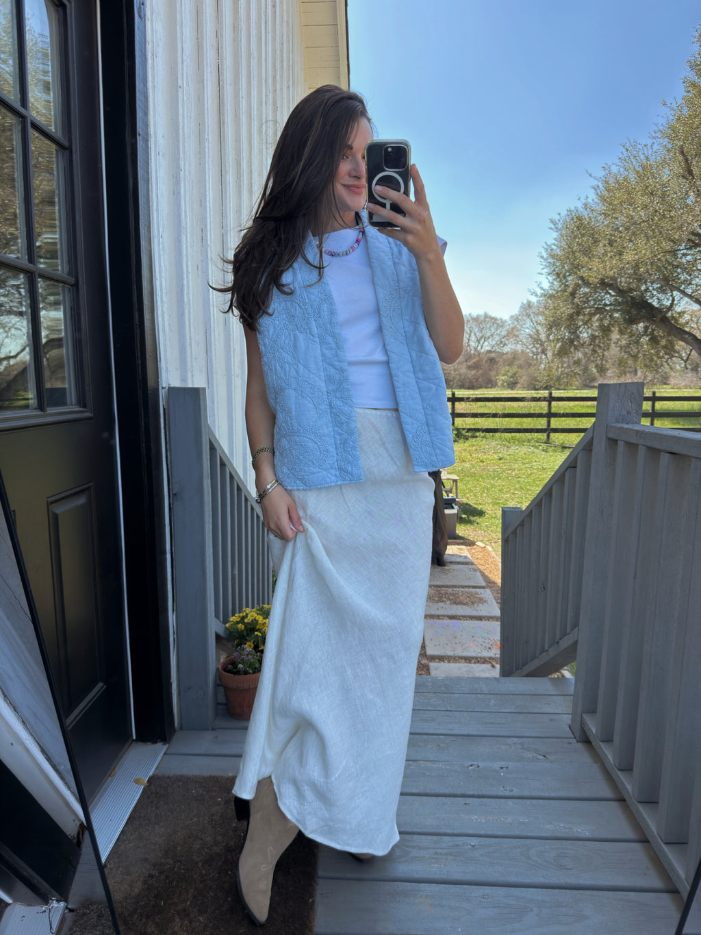 Women’s cotton quilted vest from STRIVE Boutique, a lightweight neutral layering piece