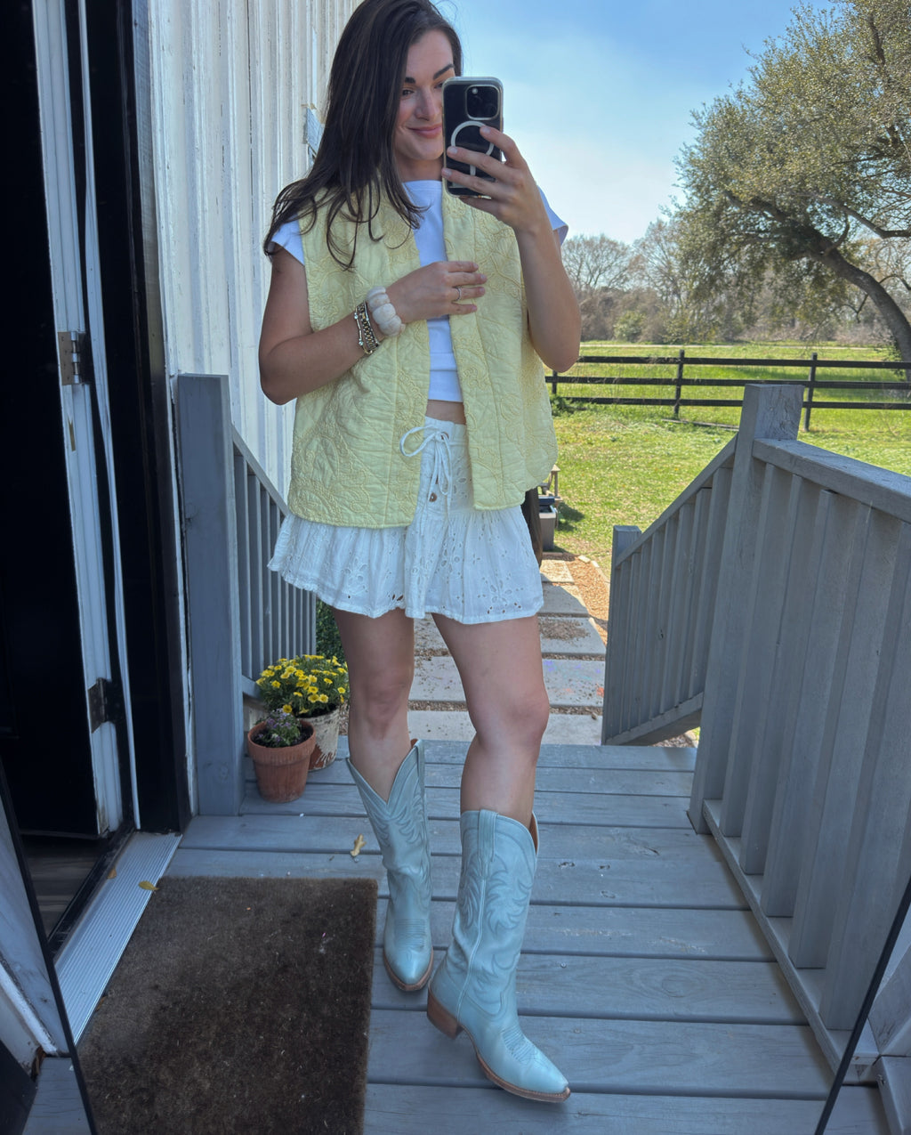 Feminine yellow cotton quilted vest from a women’s boutique styled for everyday wear